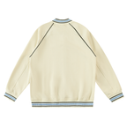Cream contrast trim varsity jacket with button front and ribbed hem, flat lay